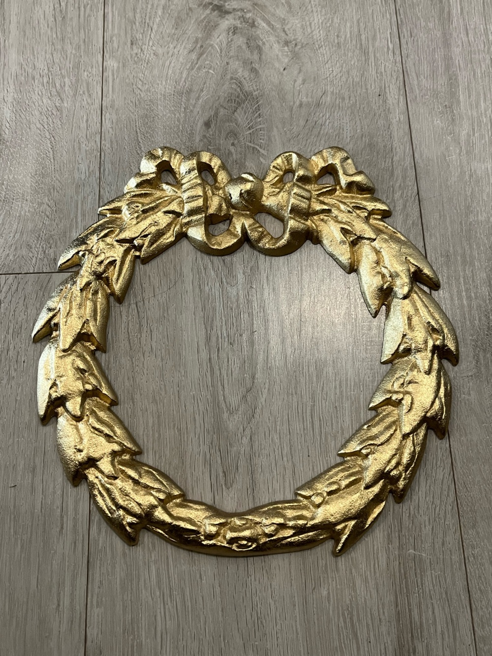 Ornate  cast iron Gold Laurel Wreath Wall Accent